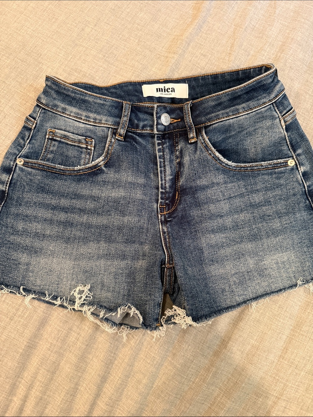 Mica Distressed Mid-Rise Blue Denim Cutoff Shorts